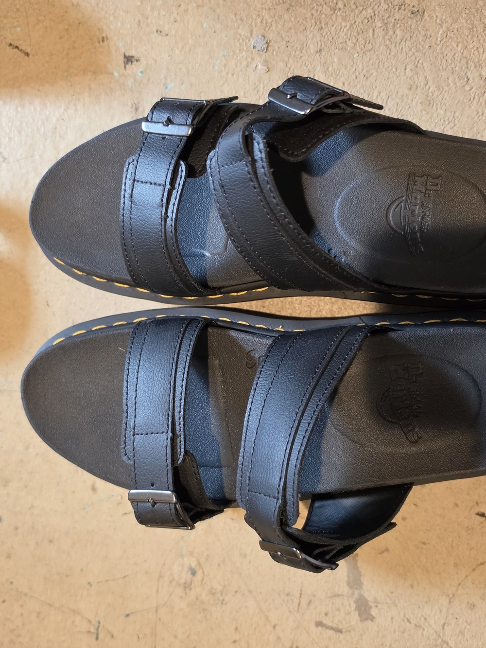 Dr. Martens Black Dual-Strap Buckle Slide Sandals with Yellow Stitching